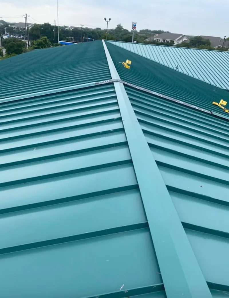 Green commercial metal roof ridge and valley for Metal Roof Repair in Massena